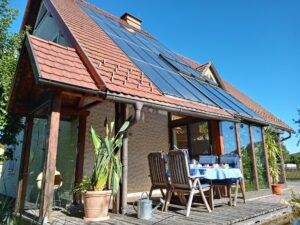 Nierdrigenergiehaus mit Wintergarten und thermischer Solaranlage mit Smart Home Steuerung